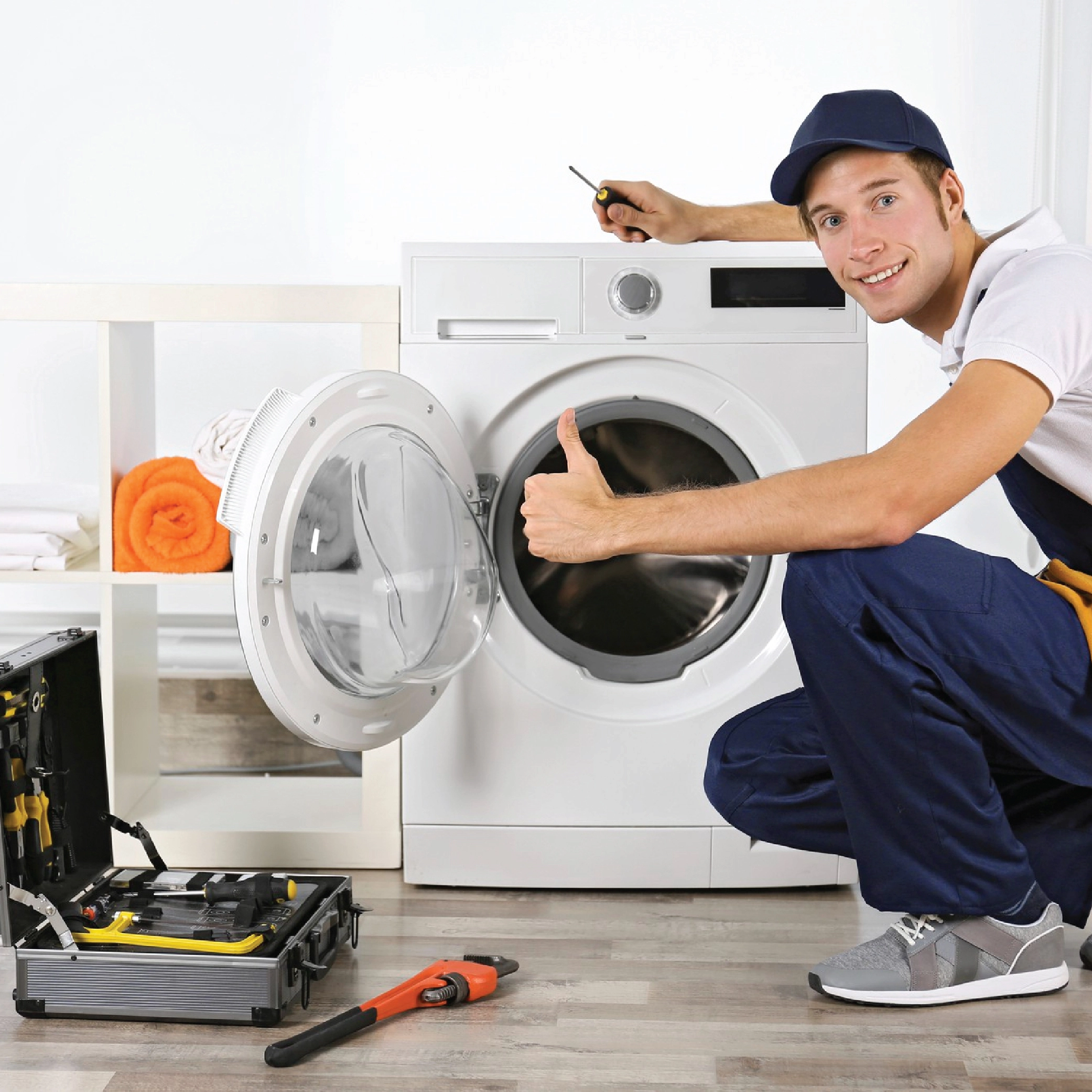 Our happy and confident mechanic after repair a washing machine