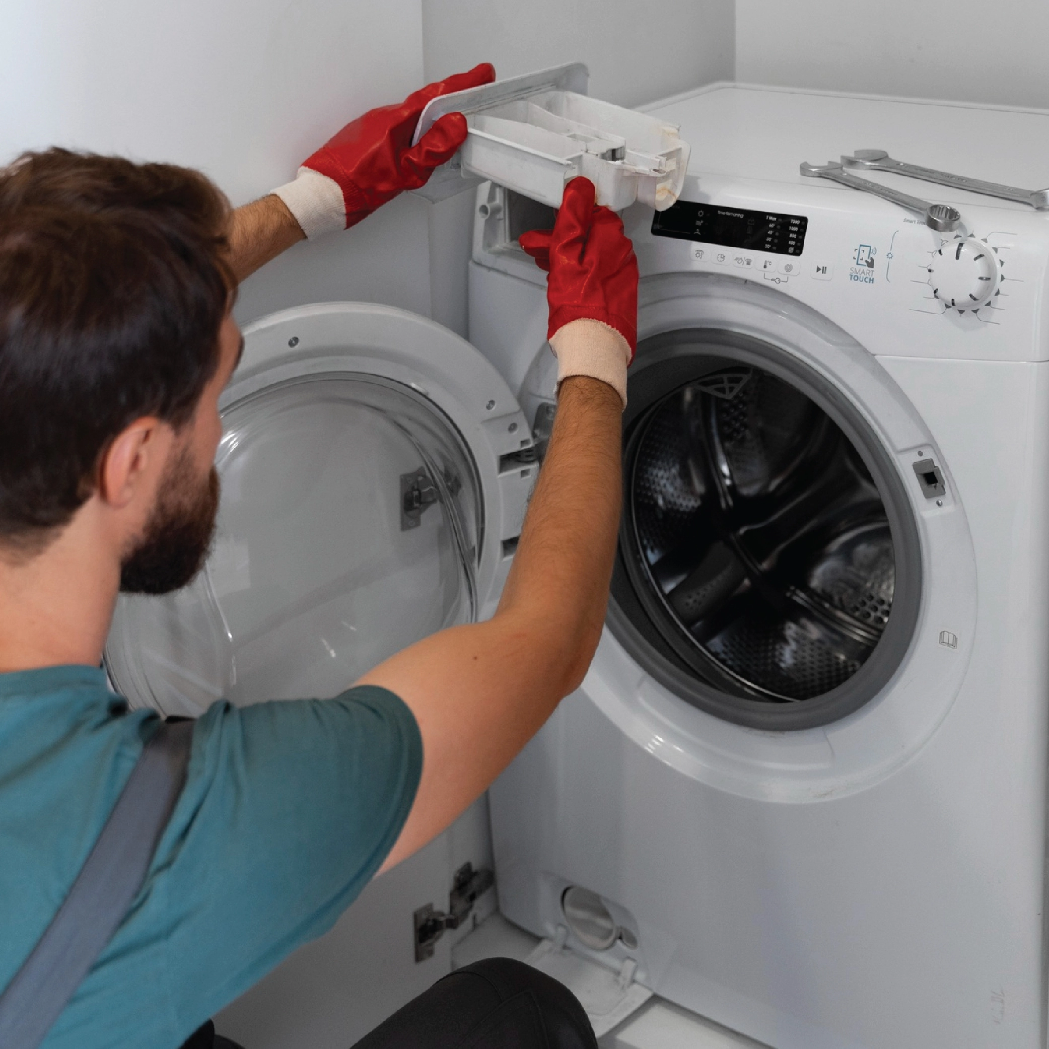 on an emergency call our experts arrive and repair front load washing machine